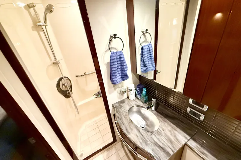 Slide: The Image of Luxurious bathroom in 2014 Sea Ray 580 Sundancer yacht with modern fixtures. - 33