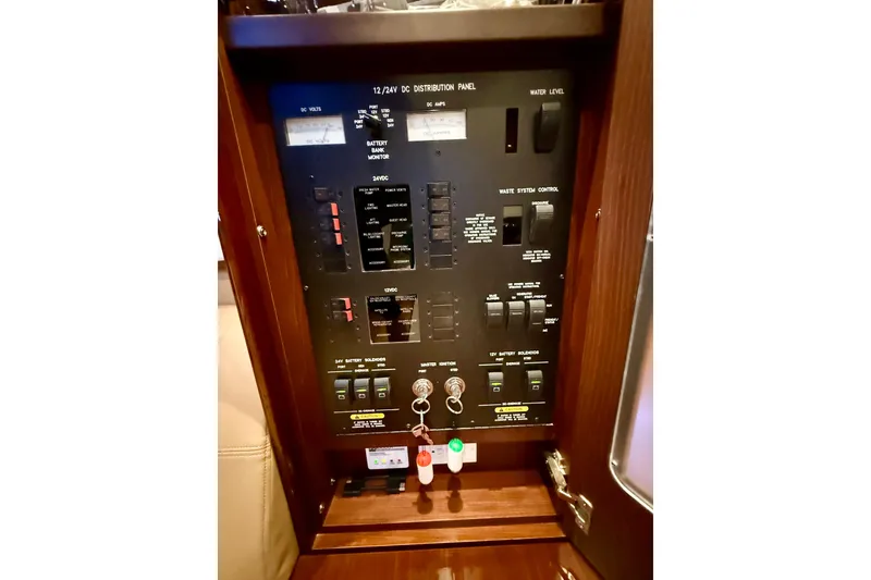 Slide: The Image of Electrical control panel on a 2014 Sea Ray 580 Sundancer yacht. - 37