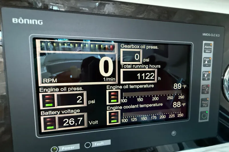 Slide: The Image of Display panel of 2014 Sea Ray 580 Sundancer showing engine metrics and running hours. - 47