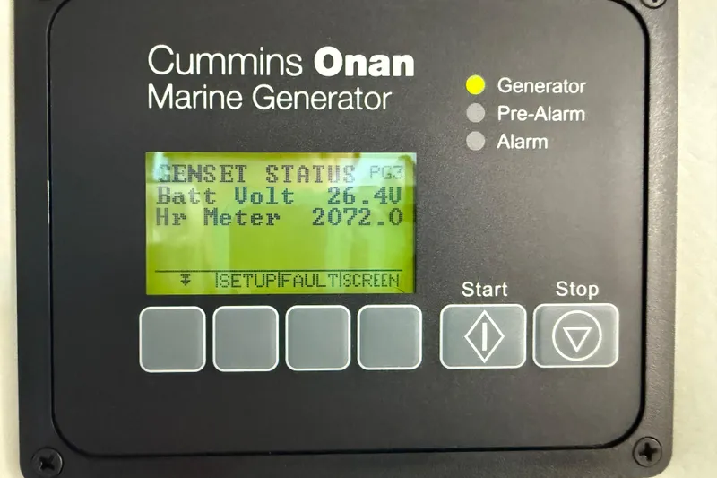 Slide: The Image of Cummins Onan marine generator display on 2014 Sea Ray 580 Sundancer, showing battery voltage and hour meter. - 60