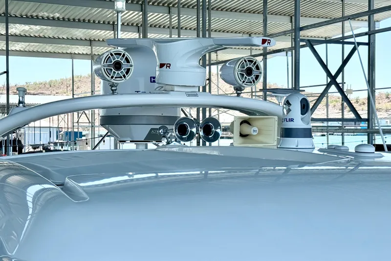 Slide: The Image of 2014 Sea Ray 580 Sundancer yacht with advanced radar and communication equipment. - 64