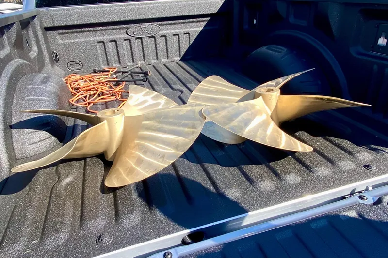Slide: The Image of Golden boat propeller in truck bed, Sea Ray 580 Sundancer 2014 model. - 67