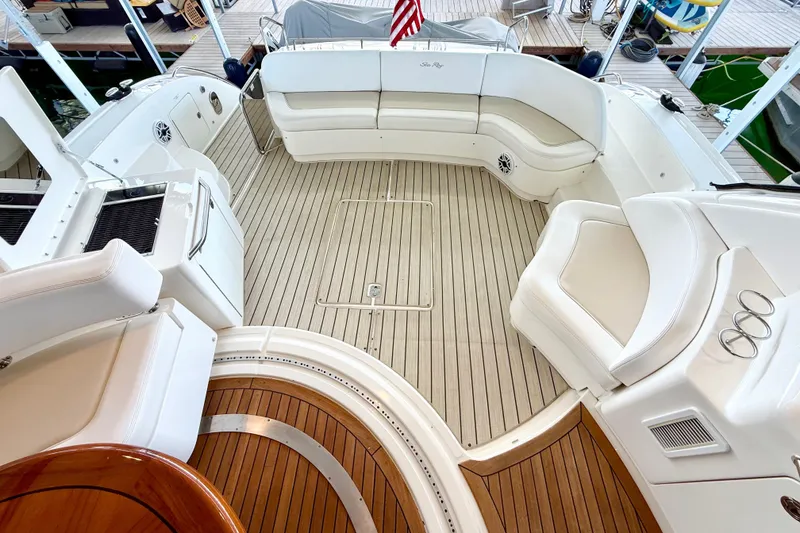 Slide: The Image of Luxurious 2014 Sea Ray 580 Sundancer yacht with spacious seating and elegant deck design. - 8