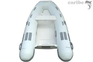 Slide: The Image of 2025 Caribe C9X inflatable boat, top view, white with gray accents. - 11