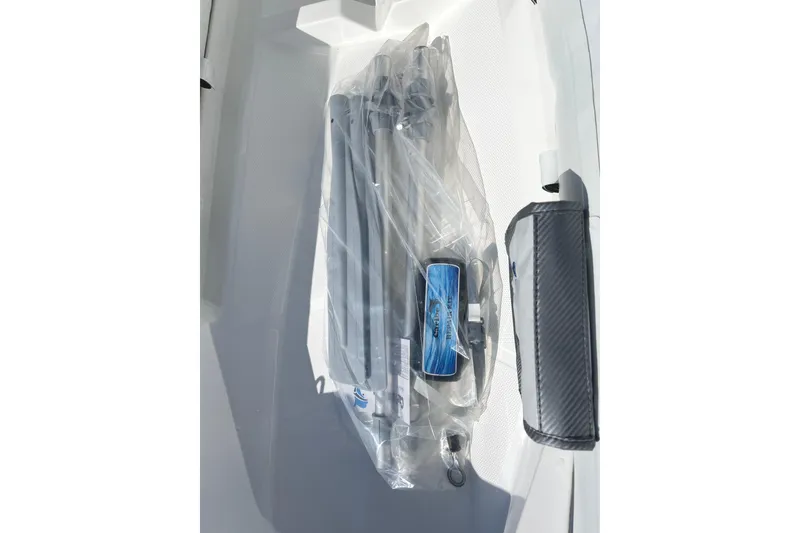 Slide: The Image of Packaged equipment inside a 2025 Caribe L8 boat, featuring a sleek, modern design. - 10