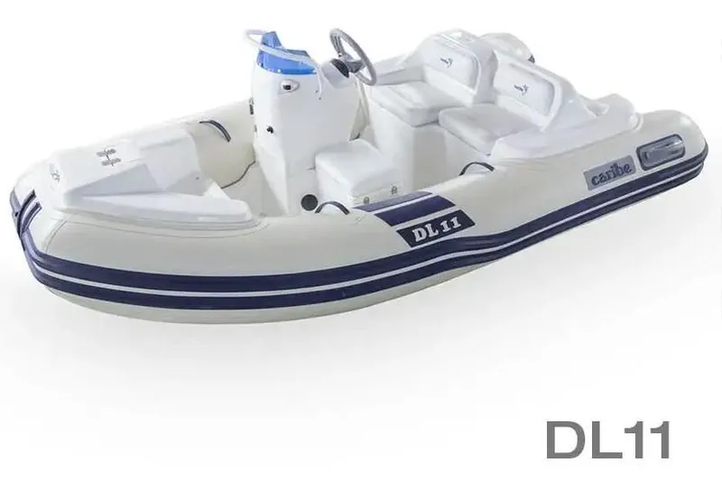 The Image of 2025 Caribe DL11 inflatable boat with white and blue design, featuring comfortable seating. - 0