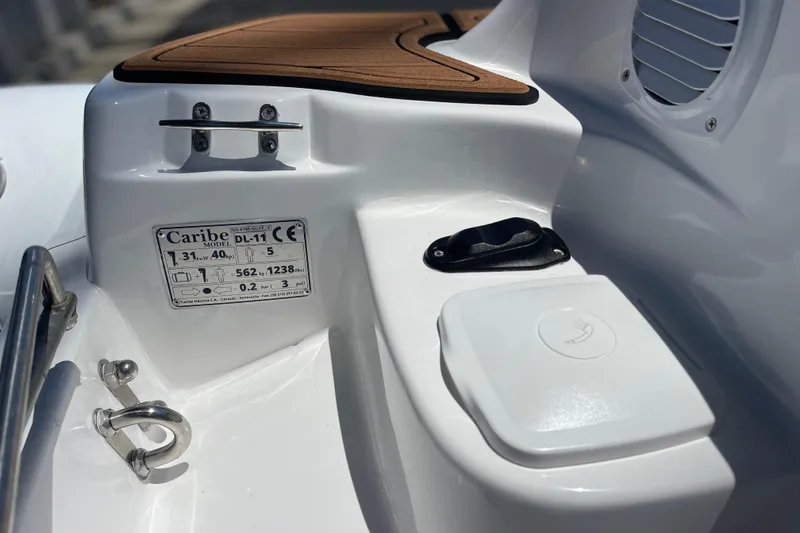 Slide: The Image of Close-up of 2025 Caribe DL11 boat details and fittings. - 12
