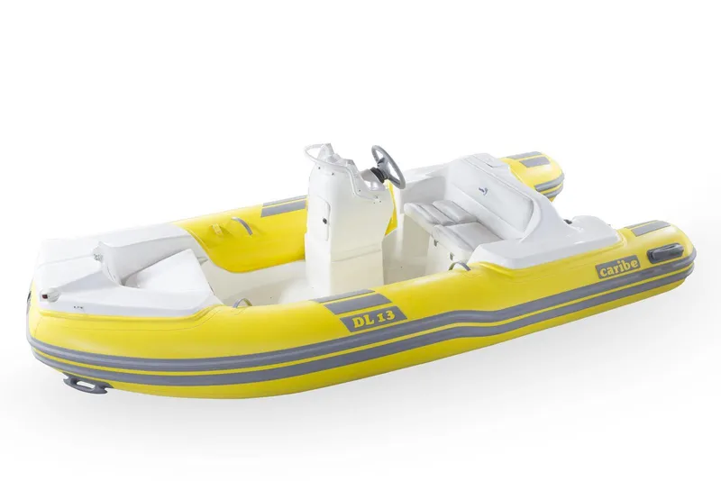 Slide: The Image of Yellow Caribe DL13 inflatable boat, 2025 model, with steering console and seating. - 5