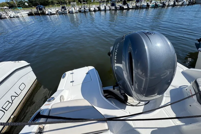 Slide: The Image of 2018 Chaparral 230 Suncoast boat with Yamaha engine docked at marina. - 22