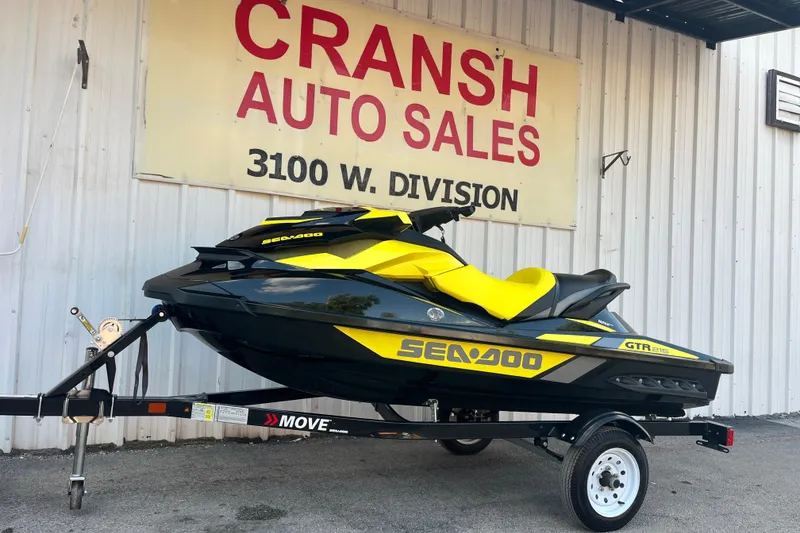Slide: The Image of 2016 Sea-Doo GTR 215 jet ski on trailer at Cransh Auto Sales. - 1