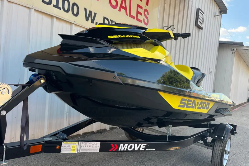 Slide: The Image of 2016 Sea-Doo GTR 215 jet ski with Rotax power, featuring bold yellow graphics. - 10