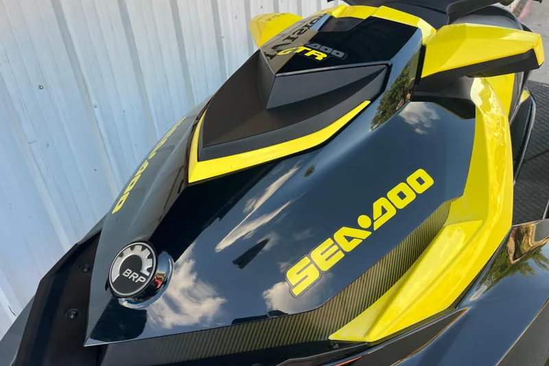 Slide: The Image of 2016 Sea-Doo GTR 215 hull underside, showcasing sleek design and reflective surface. - 15