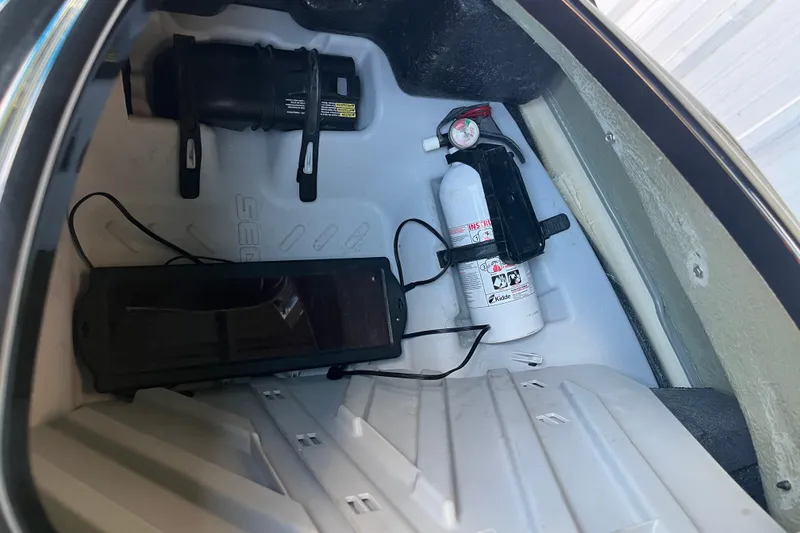 Slide: The Image of 2016 Sea-Doo GTR 215 jet ski, black and yellow design, close-up view. - 16