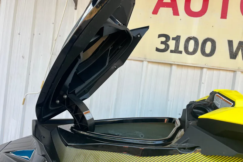 Slide: The Image of Storage compartment of a 2016 Sea-Doo GTR 215 with fire extinguisher and accessories. - 17