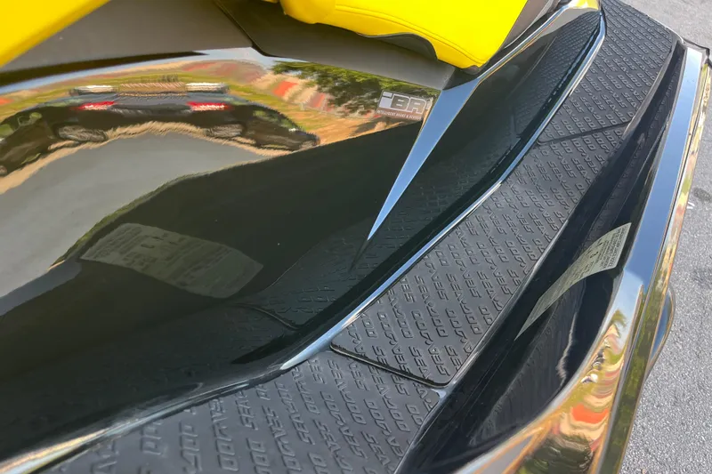 Slide: The Image of 2016 Sea-Doo GTR 215 with open storage compartment, showcasing sleek design. - 18