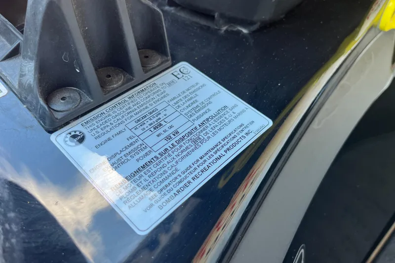 Slide: The Image of 2016 Sea-Doo GTR 215 engine close-up with black cover and yellow cap. - 21