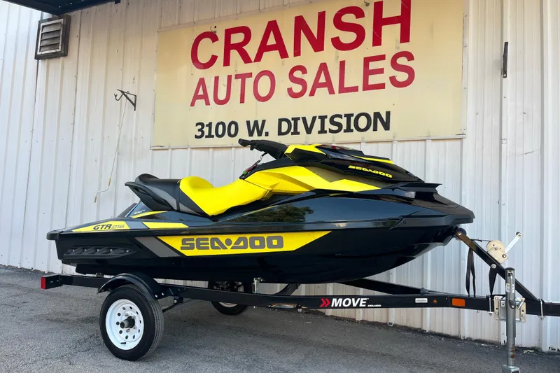 Slide: The Image of 2016 Sea-Doo GTR 215 jet ski on trailer at Cranston Auto Sales. - 28