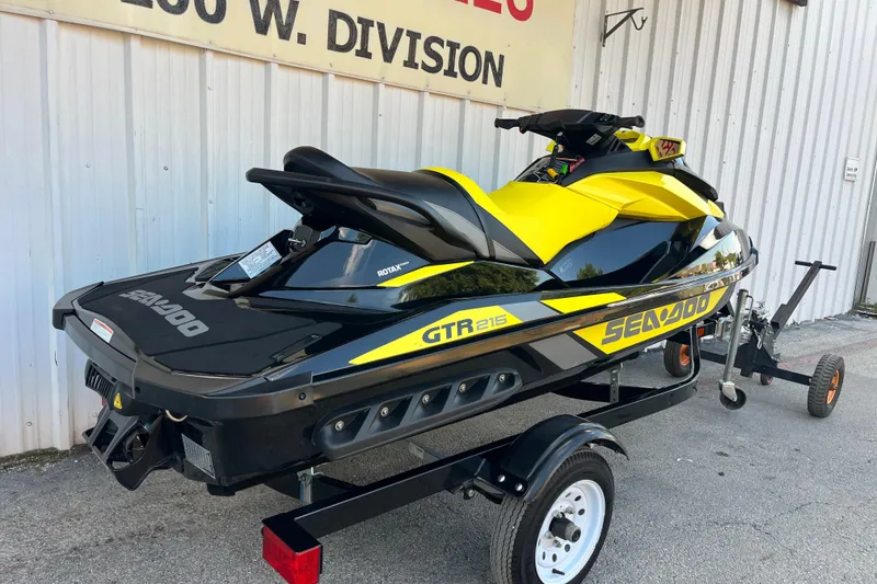 Slide: The Image of 2016 Sea-Doo GTR 215 jet ski on trailer at Cransh Auto Sales. - 29