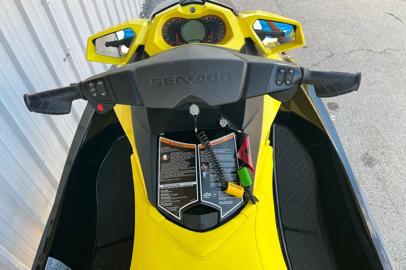 Slide: The Image of 2016 Sea-Doo GTR 215 jet ski, yellow and black, side view close-up. - 32