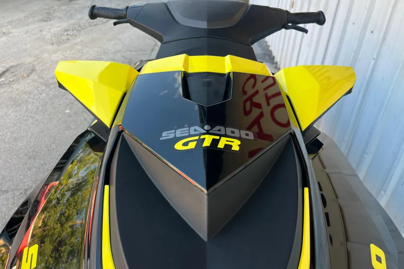 Slide: The Image of Dashboard of a 2016 Sea-Doo GTR 215, featuring speedometer and tachometer. - 36