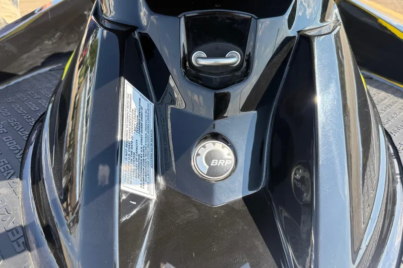 Slide: The Image of 2016 Sea-Doo GTR 215 jet ski, close-up of BRP logo and design details. - 61