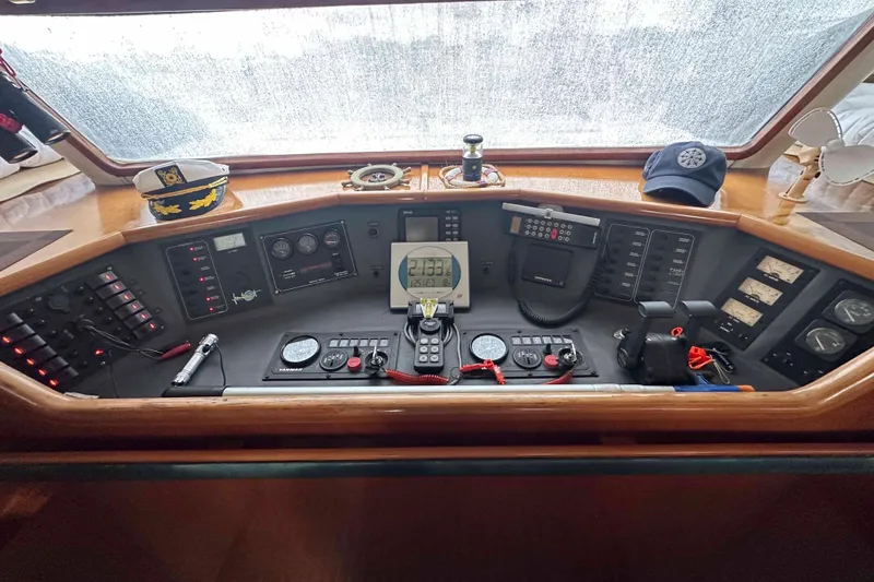 Slide: The Image of Cockpit of 1993 Jeantot Euphorie 40 yacht with navigation instruments and controls. - 12