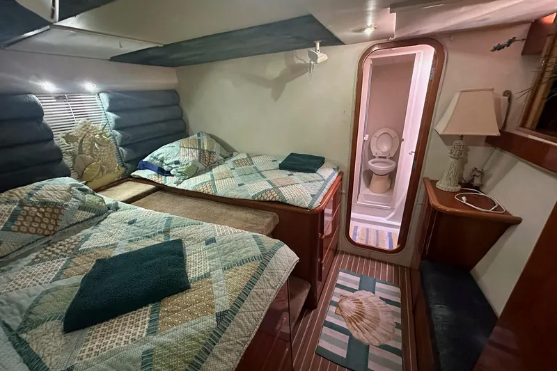 Slide: The Image of Cozy cabin interior of 1993 Jeantot Euphorie 40 with twin beds and ensuite bathroom. - 7