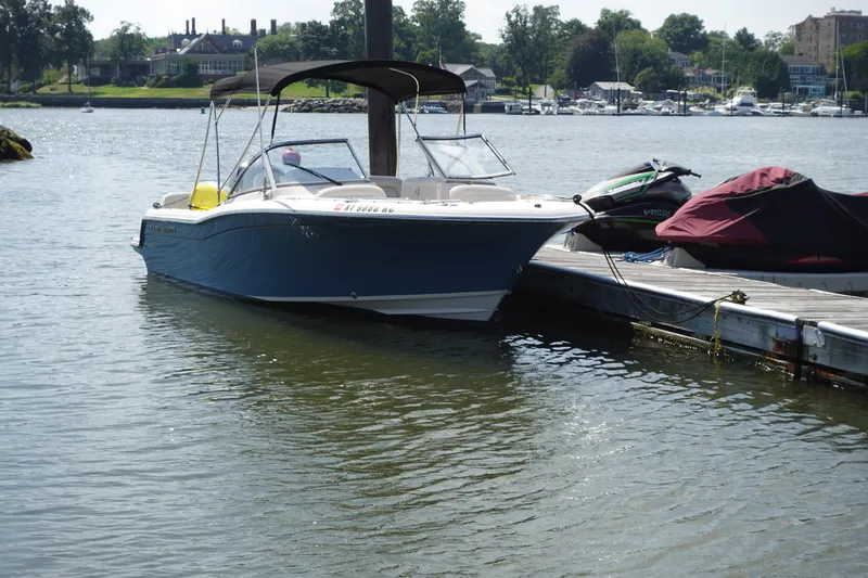 Slide: The Image of 2020 Grady-White Freedom 215 boat docked on a sunny day. - 1