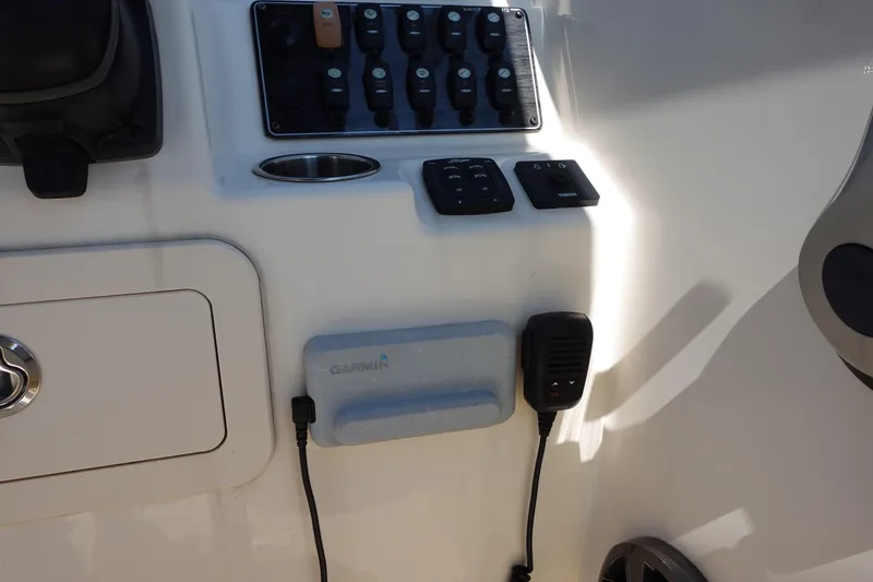 Slide: The Image of Control panel of a 2020 Grady-White Freedom 215 boat with Garmin device. - 8