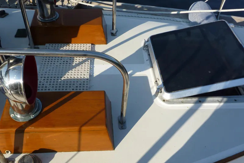 Slide: The Image of Deck of 1987 Bristol 35.5 sailboat with wooden and metal fittings. - 13