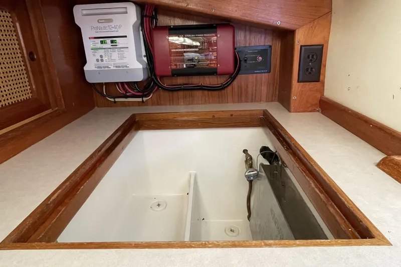 Slide: The Image of Electrical panel and storage compartment in 1987 Bristol 35.5 boat interior. - 20