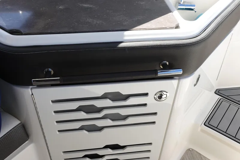 Slide: The Image of 2018 Sea Ray SLX 310 Outboard boat interior detail with sleek design and modern finishes. - 23