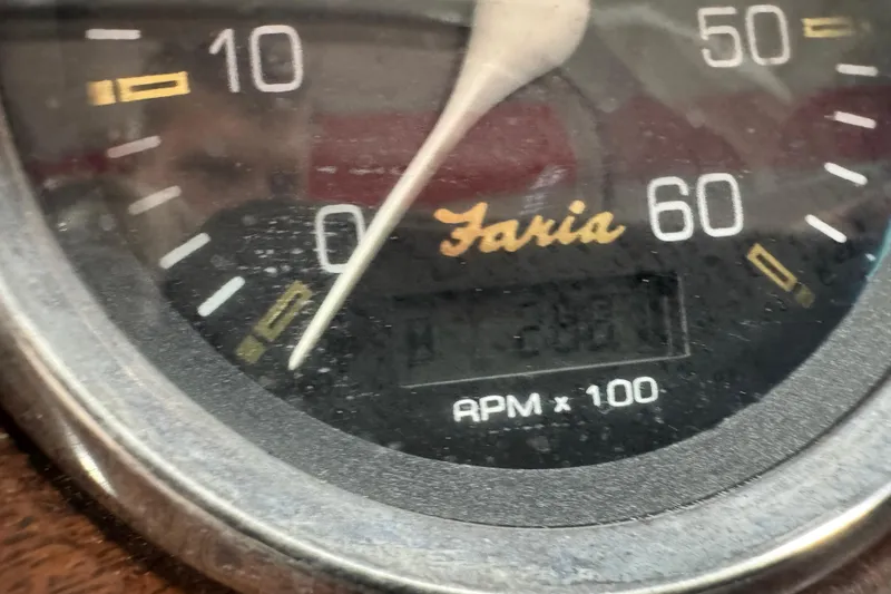 Slide: The Image of Close-up of a Faria tachometer on a 2000 Crownline 225 BR boat. - 19
