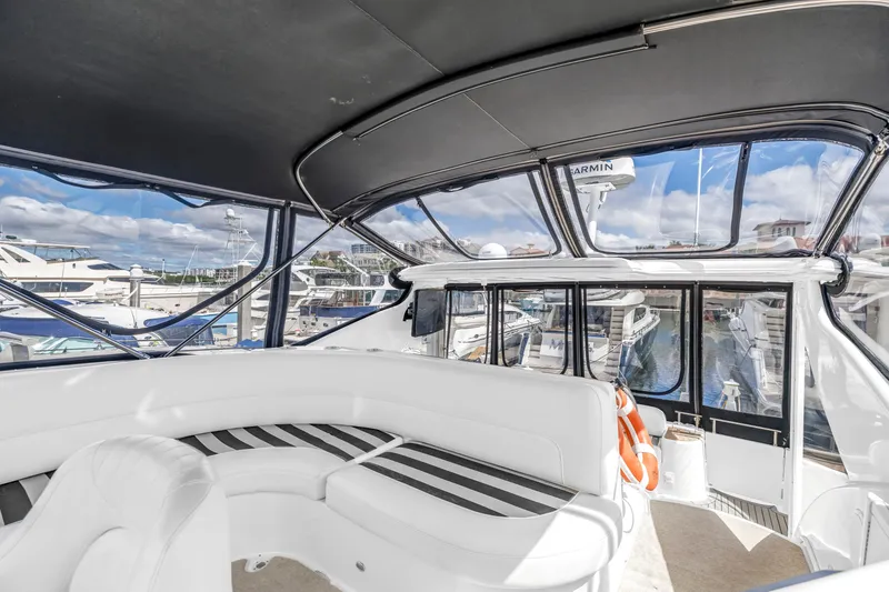 Slide: The Image of Luxurious interior of 2008 Meridian 459 Motoryacht with marina view. - 12