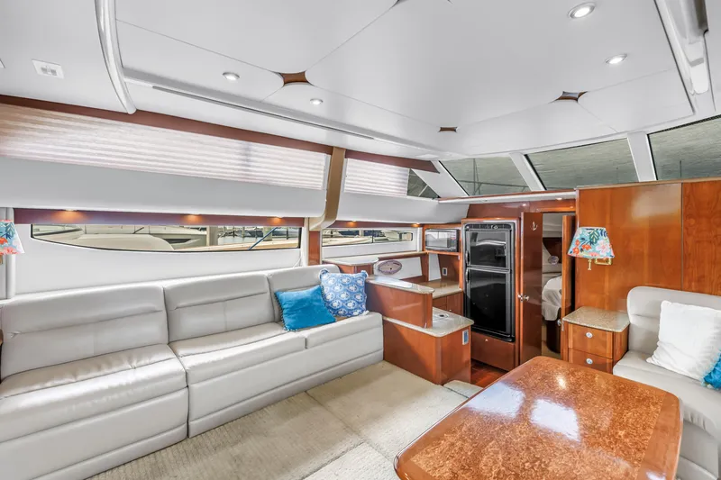 Slide: The Image of Luxurious interior of 2007 Meridian 459 Motoryacht with plush seating and elegant wood finishes. - 14