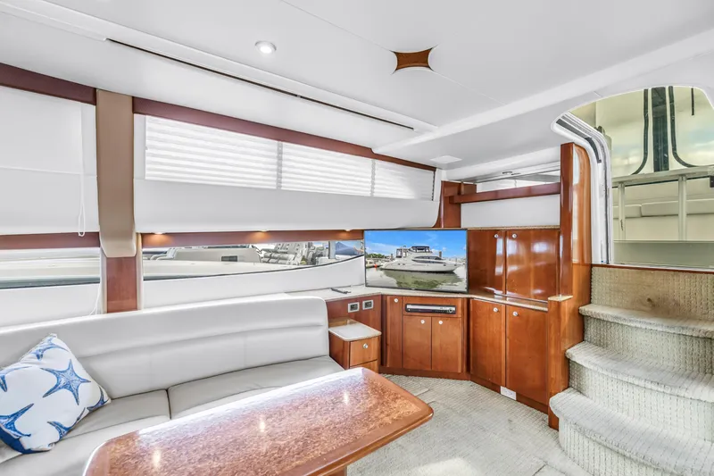 Slide: The Image of Luxurious interior of 2007 Meridian 459 Motoryacht with elegant wood finishes and modern amenities. - 15