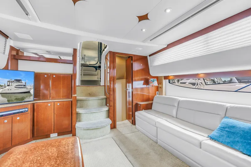 Slide: The Image of Luxurious interior of 2007 Meridian 459 Motoryacht with elegant wood finishes and plush seating. - 16