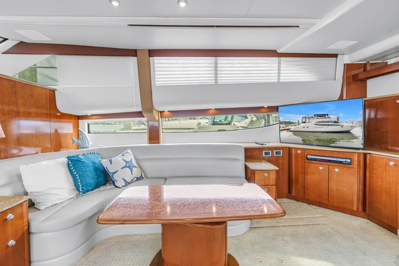 Slide: The Image of Luxurious 2007 Meridian 459 Motoryacht interior with plush seating and modern entertainment system. - 19