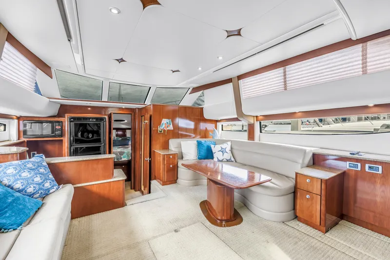 Slide: The Image of Luxurious interior of 2007 Meridian 459 Motoryacht with elegant wood finishes and plush seating. - 20