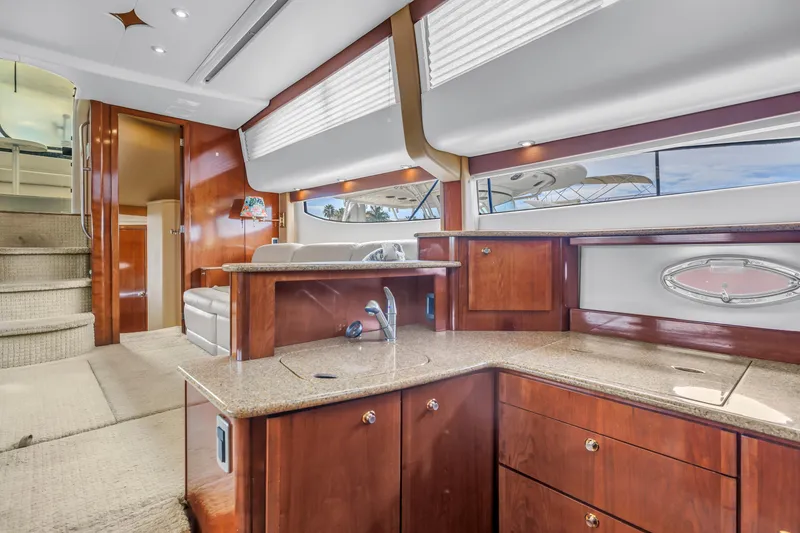 Slide: The Image of Luxurious interior of 2007 Meridian 459 Motoryacht with elegant wood finishes and modern amenities. - 22