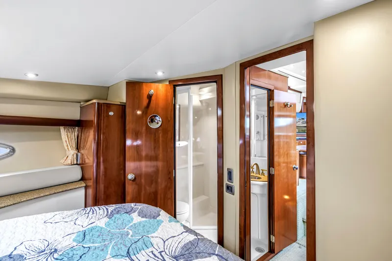 Slide: The Image of Interior of 2007 Meridian 459 Motoryacht with elegant wood finishes and cozy bedroom. - 30