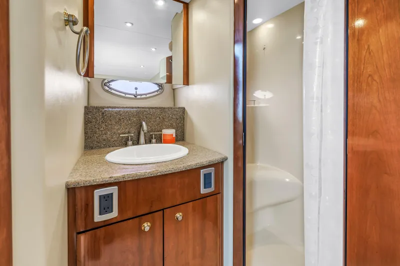 Slide: The Image of Luxurious bathroom in 2007 Meridian 459 Motoryacht with granite countertop and modern fixtures. - 33