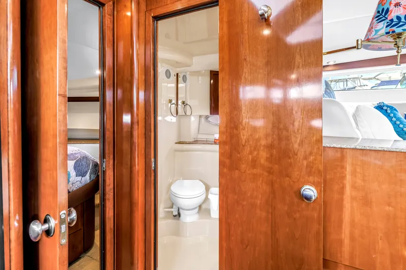 Slide: The Image of Luxurious 2007 Meridian 459 Motoryacht interior with wooden finishes and modern amenities. - 35