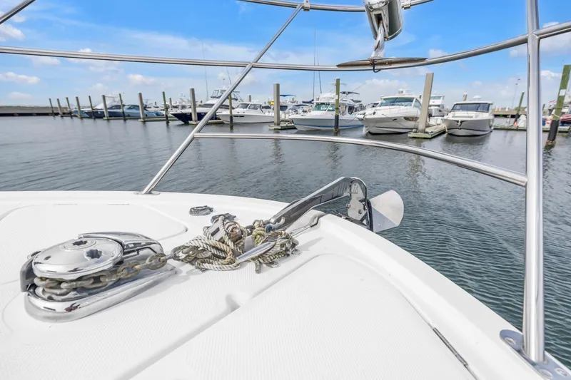 Slide: The Image of Bow view of 2007 Meridian 459 Motoryacht docked in a marina. - 39