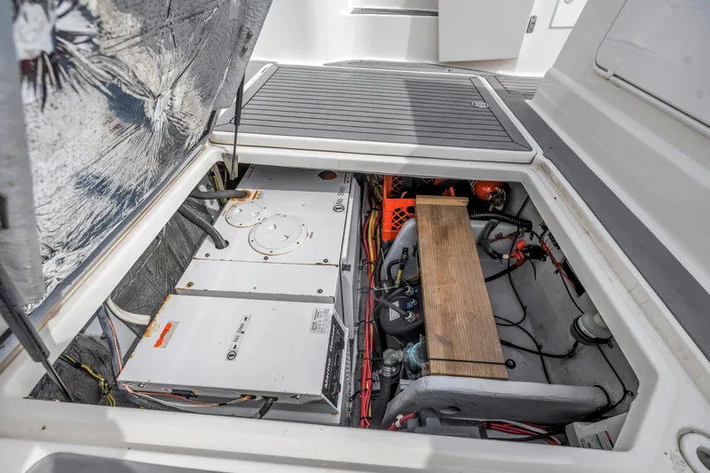 Slide: The Image of Engine compartment of 2007 Meridian 459 Motoryacht, showcasing mechanical components and wiring. - 45