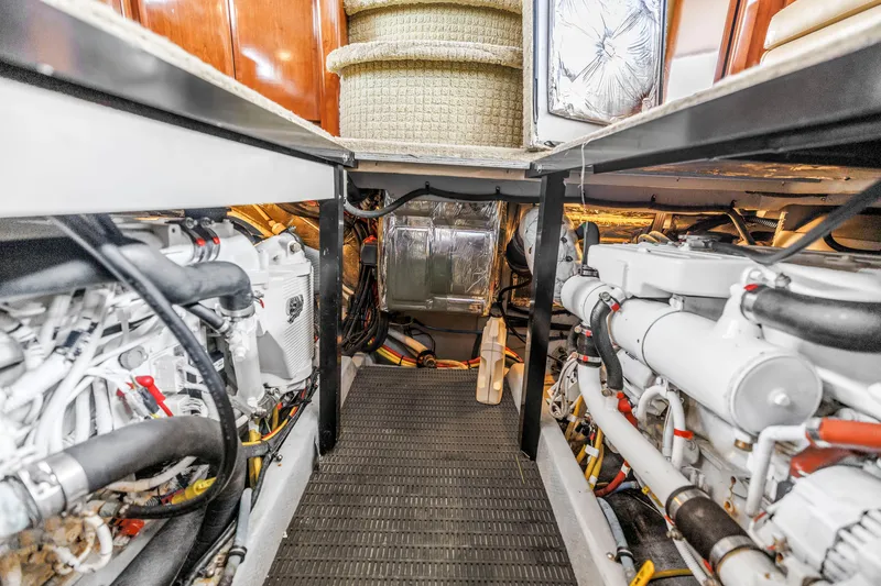 Slide: The Image of Engine room of 2007 Meridian 459 Motoryacht, showcasing dual engines and mechanical components. - 48