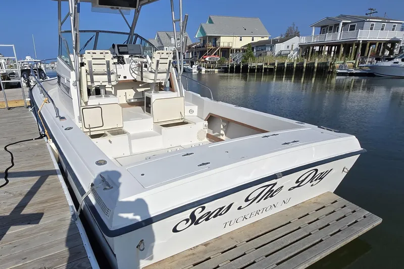 Slide: The Image of 1992 Grady-White Sailfish 25 Sportbridge docked, named "Seas The Day," in Tuckerton, NJ marina. - 42