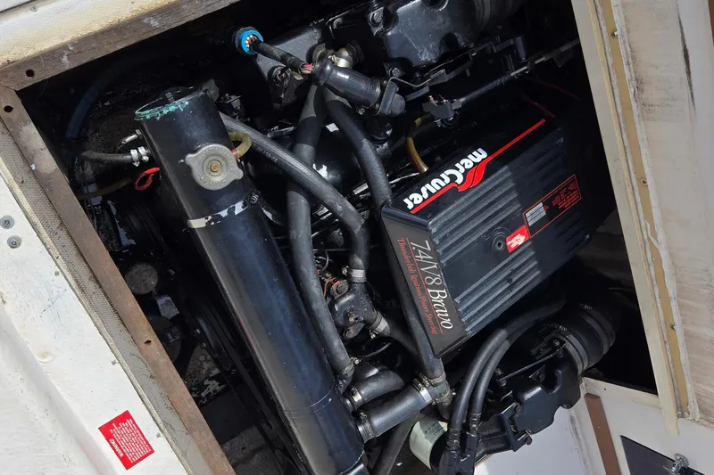 Slide: The Image of Engine compartment of a 1992 Grady-White Sailfish 25 Sportbridge with MerCruiser components. - 44