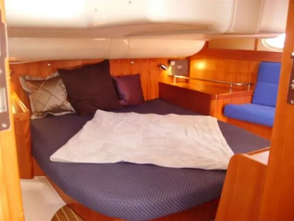 Slide: The Image of Cozy cabin interior of 2007 Elan Impression 434 yacht with comfortable bedding. - 10