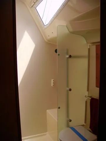 Slide: The Image of Bathroom interior of 2007 Elan Impression 434 yacht with skylight and glass partition. - 13